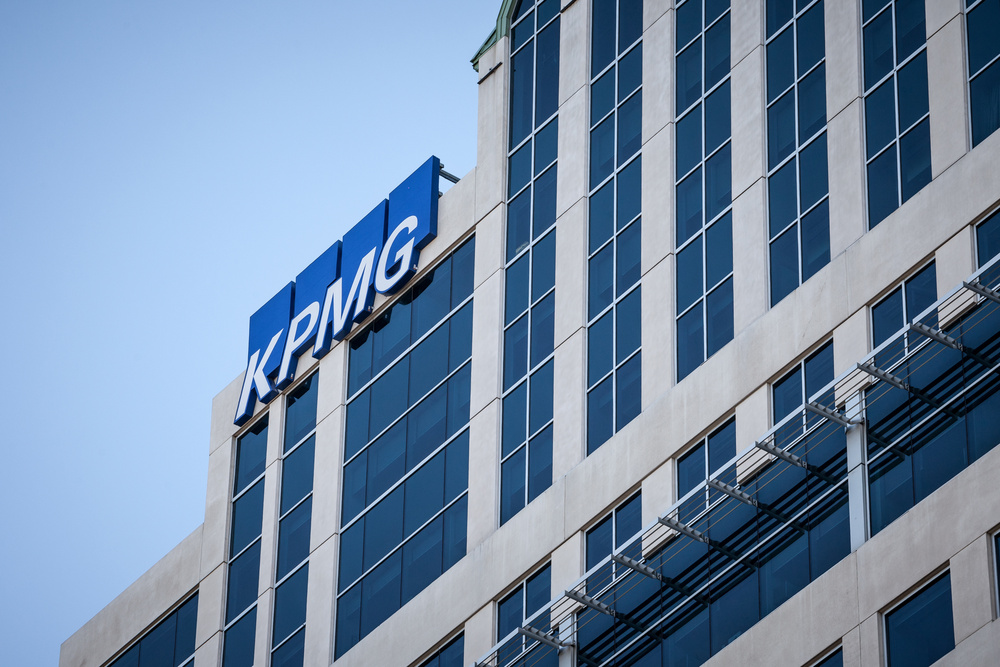 OTTAWA, CANADA - NOVEMBER 11, 2018: KPMG logo on their main office for Ottawa, Ontario, in a business district. KPMG is one of the main audit firms in the world, within the Big Four Group

Picture of KPMG logo on a skyscraper in the afternoon in Ottawa downtown CBD, Onario, Canada. KPMG is a professional service company and one of the Big Four auditors