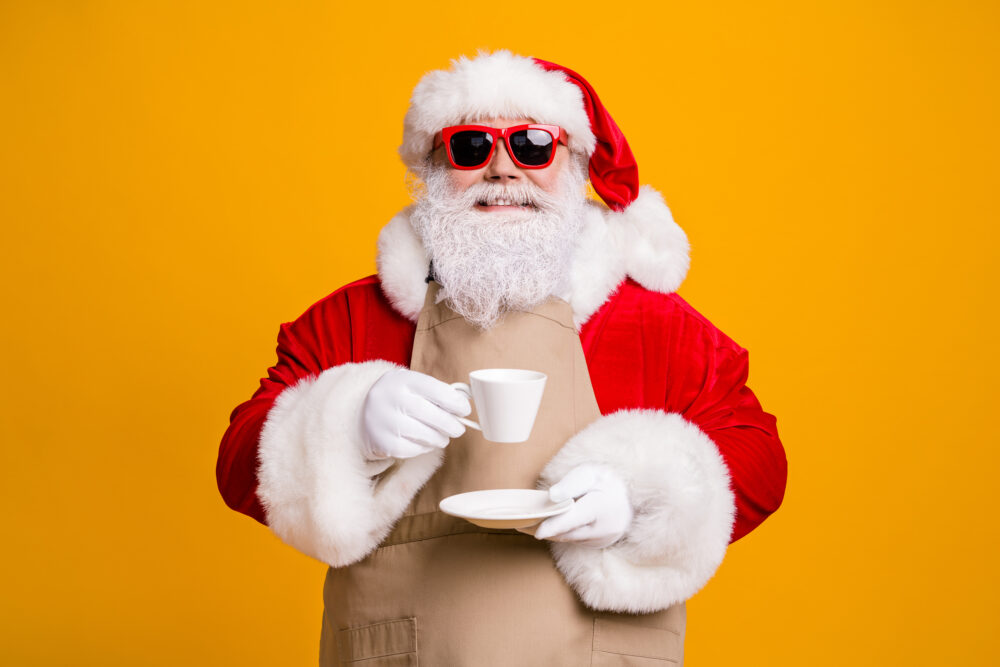 Portrait of nice attractive cheerful confident Santa father shop owner, businessman entrepreneur drinking cappuccino rest relax pause break isolated bright vivid shine vibrant yellow color background