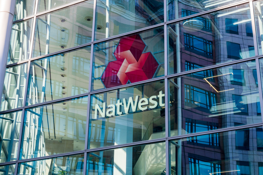 London, Bishopsgate, Spitalfields, UK. May 21st 2020: National Westminster Bank, commonly known as NatWest, is a major retail and commercial bank in the United Kingdom. The main entrance logo sign.