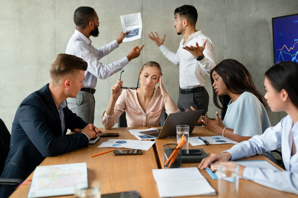 Workplace Conflicts. Stressed Group Of Business People Having Disagreements During Corporate Meeting