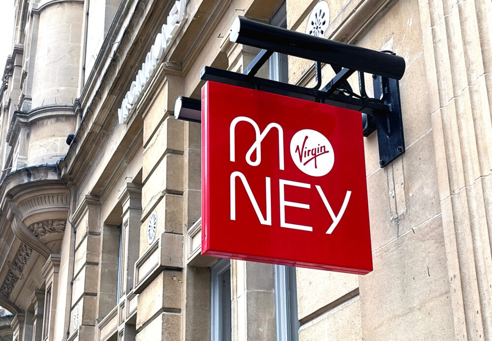 Cardiff, Wales - February 2022: Sign above the entrance to the branch of Virgin Money in Cardiff city centre