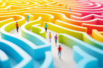 Close-up of a colorful maze with miniature figures navigating through it, representing challenges, decision-making, problem-solving, and strategic planning in business and personal development.