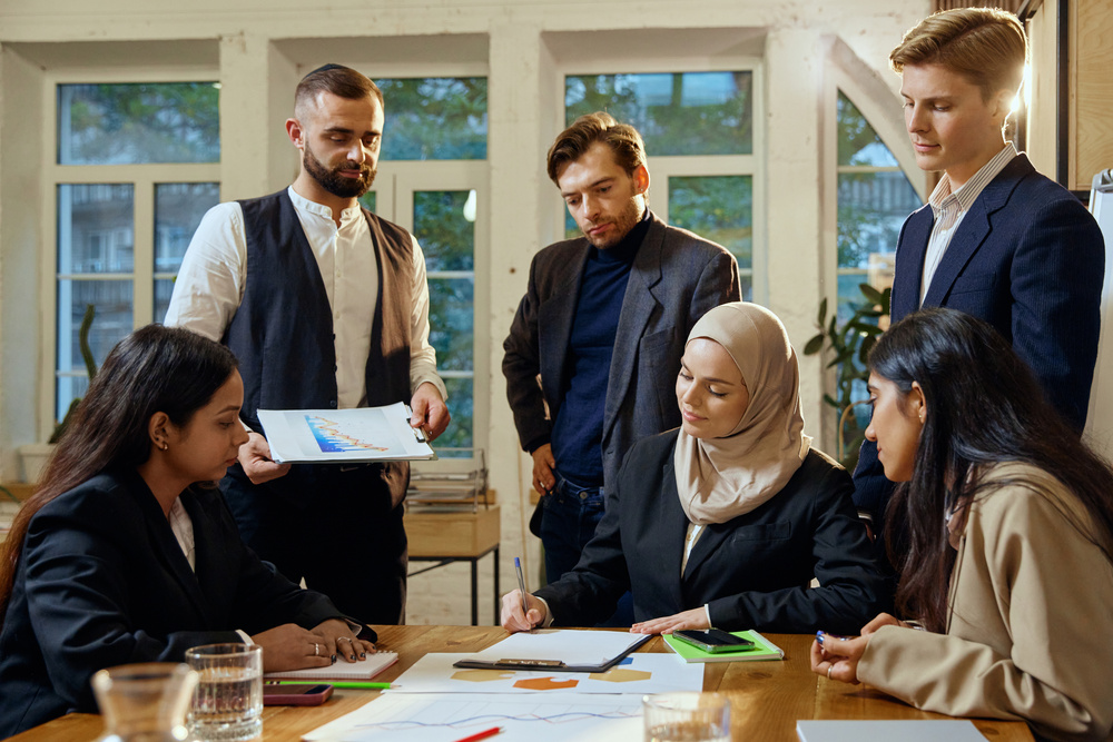 Diverse team in discussion, illustrating data-informed DEI decision-making