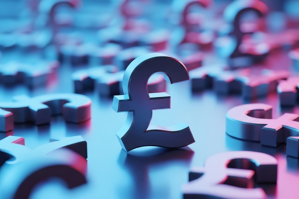 Pound sign symbols lying on the ground with one standing upright, representing financial resilience and recovery in employee financial wellbeing