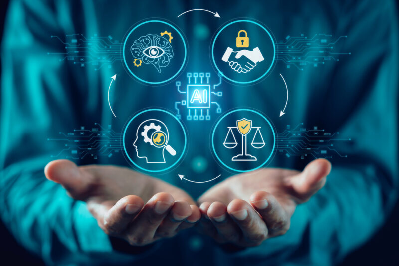 Professional holding core elements of a workplace wellbeing framework representing skills, standards and best practice.