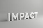 Word “impact” cast in concrete representing lasting change in workplace culture and employee health and wellbeing