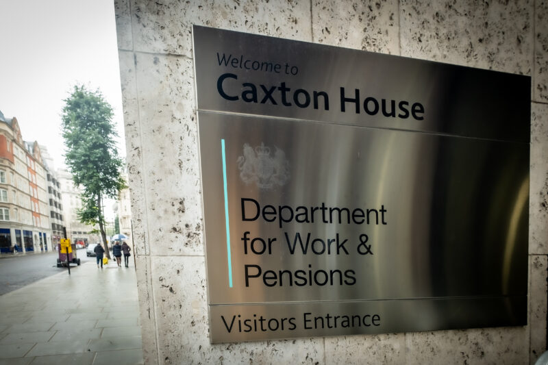 Department for Work and Pensions (DWP) sign outside a UK government building, representing new return-to-work benefits reforms