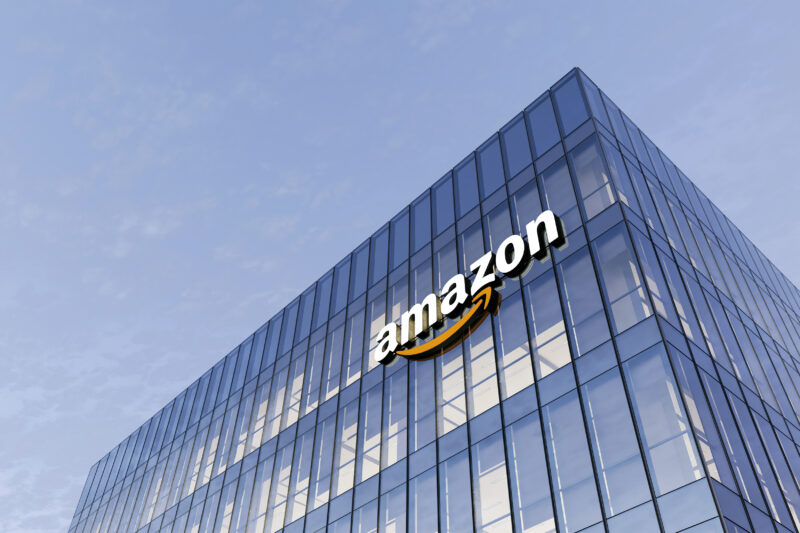 Exterior of an Amazon office building displaying the Amazon logo.