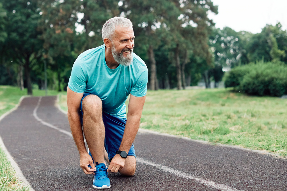 Image of a happy active man on a run