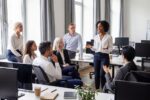 Diverse group of managers taking part in a leadership development workshop